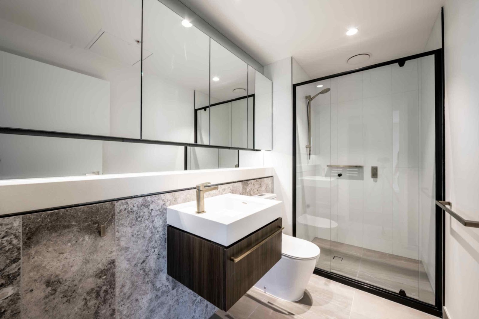 Lighting & Mirror Tricks to Open Up Compact Australian Bathrooms