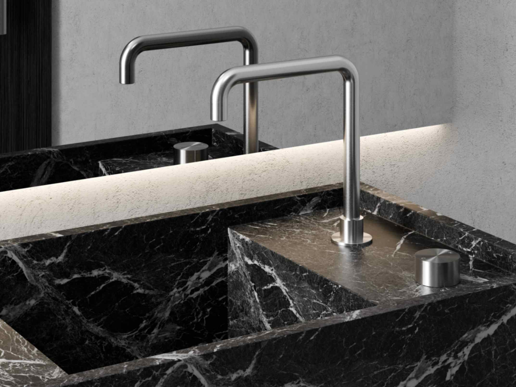 Black Marquina marble bathroom vanity top featuring Nero Tapware’s Kara Progressive Tall basin set in brushed nickel