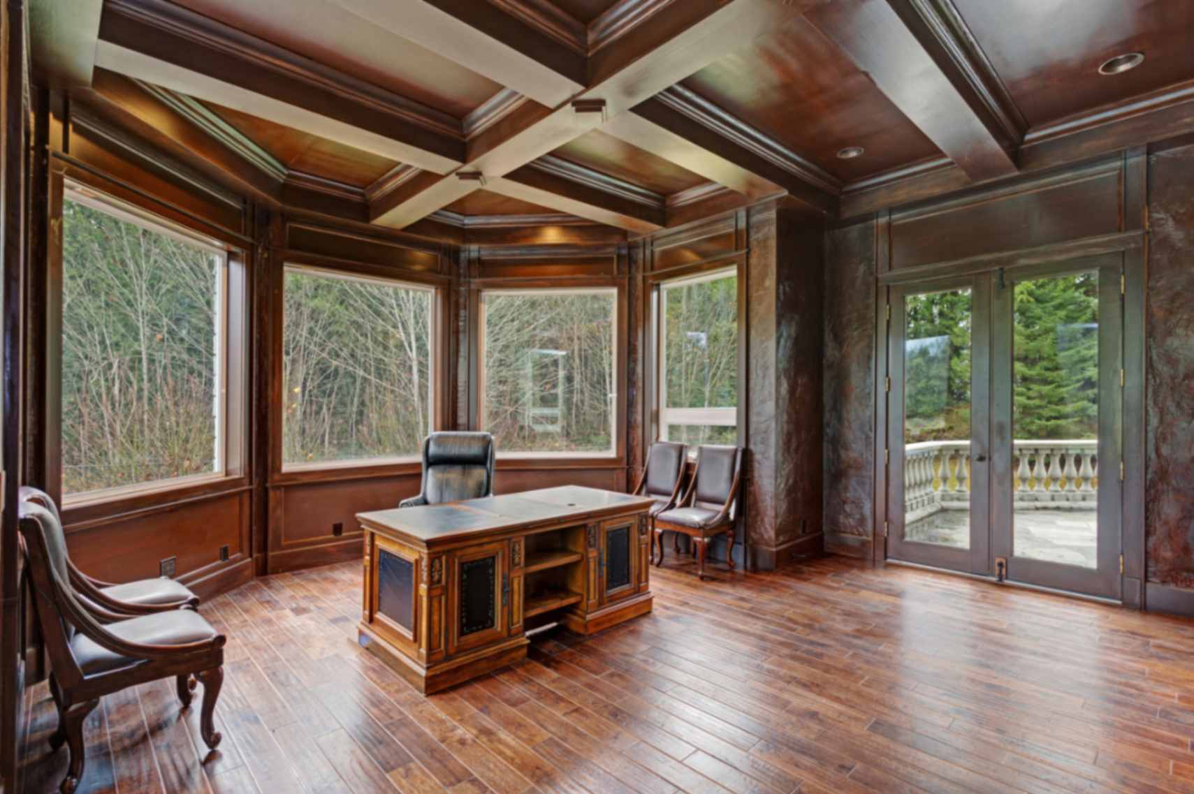 Where Coffered Ceilings Work Best featuring Chic Wood Paneled Home office