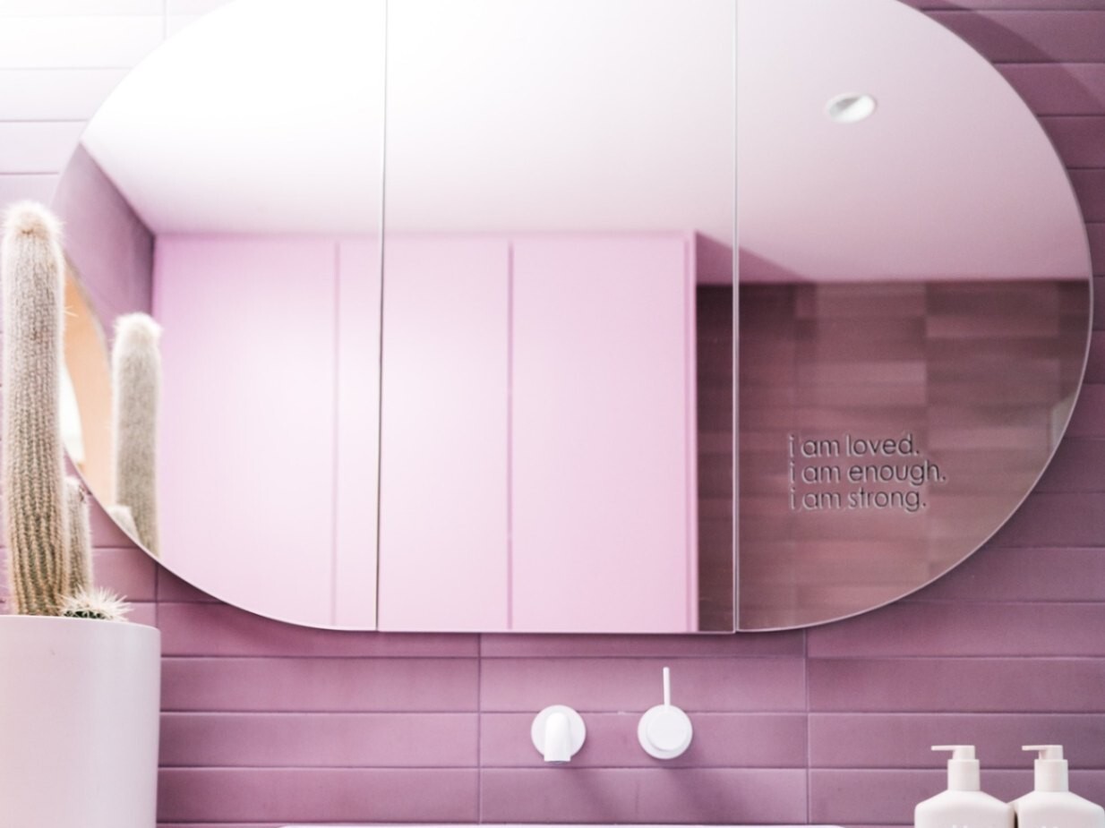 Purple Bathroom Lighting & Mirror Accents